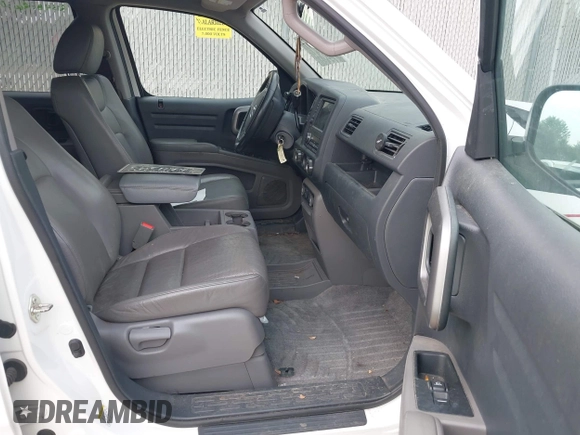 2013 Honda Ridgeline RTL with VIN 5FPYK1F58DB018542, listed as a IAAI auction lot 42465817 with 112,898 mi miles and . Bid and sale history available at DreamBid. Image 5.