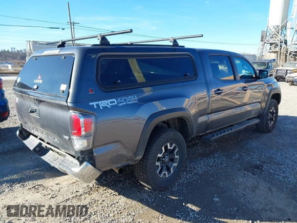 2021 Toyota Tacoma 4WD SR5 with VIN 5TFDZ5BN8MX058531, listed as a IAAI auction lot 41628820 with 102,004 mi miles. Bid and sale history available at carsss.com. Image 4.