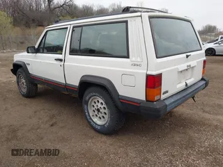 1996 Jeep Cherokee Sport with VIN 1J4FJ67S4TL224743, listed as a IAAI auction lot 42083533 with 253,847 mi miles. Bid and sale history available at carsss.com. Image 3.