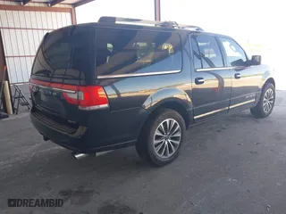 2015 Lincoln Navigator L with VIN 5LMJJ3JT0FEJ12569, listed as a IAAI auction lot 41909517 with 165,631 mi miles. Bid and sale history available at carsss.com. Image 4.