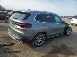 2025 BMW X5 xDrive40i with VIN 5UX23EU01S9Z44555, listed as a Copart auction lot 48656295 with 90 mi miles and Salvage Title. Bid and sale history available at carsss.com. Image 3.