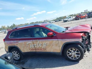 2015 Jeep Cherokee Latitude with VIN 1C4PJLCB0FW643402, listed as a IAAI auction lot 41811328 with 110,232 mi miles and . Bid and sale history available at DreamBid. Image 14.