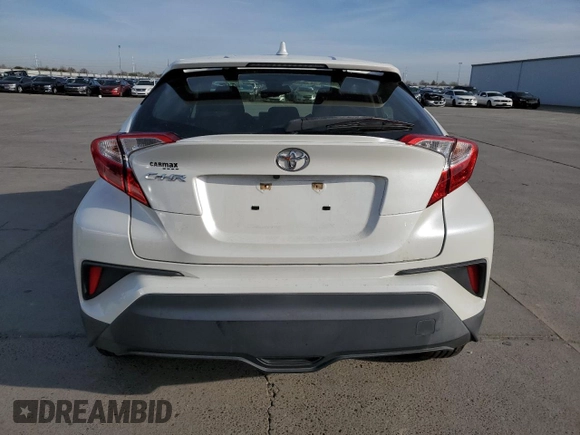2019 Toyota C-HR XLE with VIN JTNKHMBX3K1036759, listed as a Copart auction lot 48520215 with 56,609 mi miles and Salvage Title. Bid and sale history available at DreamBid. Image 6.