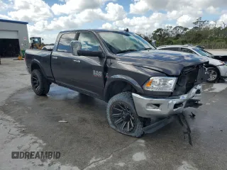 2014 Ram 2500 Laramie with VIN 3C6UR5FL0EG148066, listed as a Copart auction lot 42795415 with 202,415 mi miles and Salvage Title. Bid and sale history available at carsss.com. Image 4.