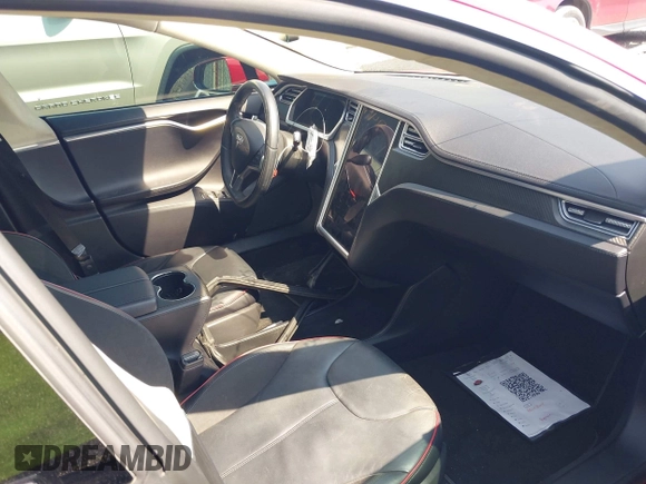 2013 Tesla Model S Performance with VIN 5YJSA1CP6DFP17689, listed as a IAAI auction lot 42483390 with 51,432 mi miles and . Bid and sale history available at DreamBid. Image 5.