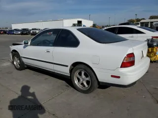 1994 Honda Accord LX with VIN 1HGCD7239RA023822, listed as a Copart auction lot 77522983 with 244,934 mi miles and Salvage Title. Bid and sale history available at carsss.com. Image 2.