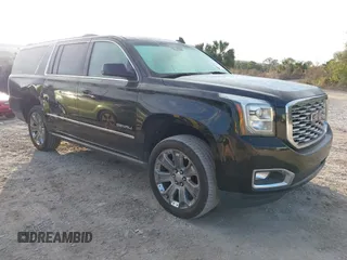 2019 GMC Yukon XL Denali with VIN 1GKS2HKJ2KR226275, listed as a IAAI auction lot 41552828 with 82,069 mi miles. Bid and sale history available at carsss.com. Image 1.