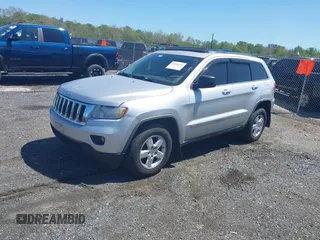 2011 Jeep Grand Cherokee 70th Anniversary with VIN 1J4RR4GG8BC515170, listed as a IAAI auction lot 42135654 with 208,638 mi miles. Bid and sale history available at carsss.com. Image 2.