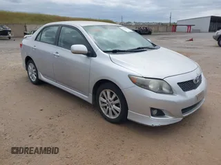 2009 Toyota Corolla with VIN 1NXBU40EX9Z028809, listed as a IAAI auction lot 42111892 with 156,182 mi miles. Bid and sale history available at carsss.com. Image 1.
