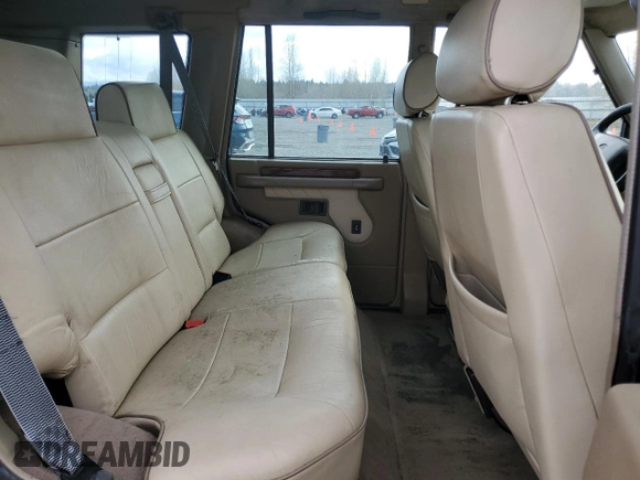 1998 Land Rover Discovery SD z VIN SALJY1248WA753645, wystawiony jako Copart lot #47944795 z przebiegiem 181 974 mil mil oraz Czysty tytuł • Clean title. Historia ofert i sprzedaży dostępna na DreamBid. Obrazek 11.
