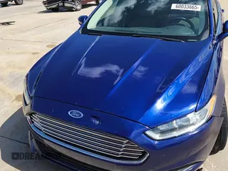 2013 Ford Fusion SE Hybrid with VIN 3FA6P0LU0DR273438, listed as a Copart auction lot 60033665 with 74,474 mi miles and Salvage title. Bid and sale history available at DreamBid. Image 13.