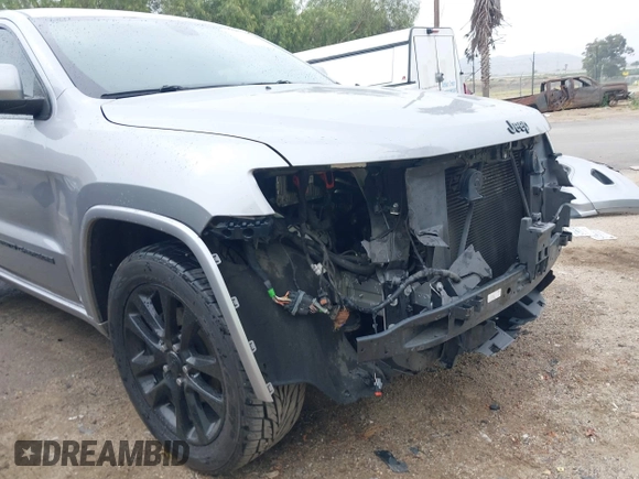 2017 Jeep Grand Cherokee Laredo with VIN 1C4RJEAG0HC702195, listed as a IAAI auction lot 42427597 with 104,403 mi miles and . Bid and sale history available at DreamBid. Image 19.