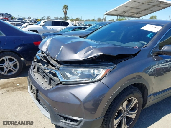 2018 Honda CR-V LX with VIN 2HKRW5H30JH407287, listed as a IAAI auction lot 41866888 with 131,741 mi miles. Bid and sale history available at carsss.com. Image 6.