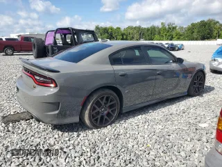 2019 Dodge Charger Scat Pack z VIN 2C3CDXGJ2KH633854, wystawiony jako Copart lot #53296705 z przebiegiem 74 285 mil mil oraz Czysty tytuł • Clean title. Historia ofert i sprzedaży dostępna na DreamBid. Obrazek 3.