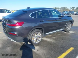 2020 BMW X4 xDrive30i with VIN 5UX2V1C07L9B83698, listed as a IAAI auction lot 41860487 with 51,891 mi miles. Bid and sale history available at carsss.com. Image 4.
