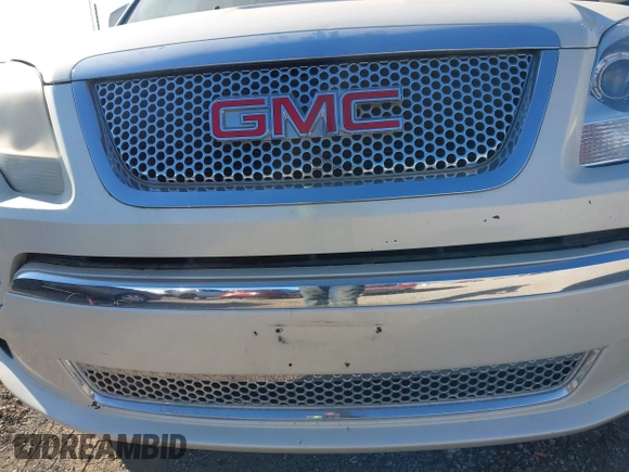 2011 GMC Acadia Denali with VIN 1GKKRTED0BJ325910, listed as a IAAI auction lot 41490017 with 172,155 mi miles and . Bid and sale history available at DreamBid. Image 6.