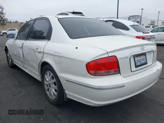 2004 Hyundai Sonata GLS with VIN KMHWF35H64A946091, listed as a IAAI auction lot 41871059 with 150,658 mi miles. Bid and sale history available at carsss.com. Image 3.