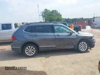 2018 Volkswagen Tiguan SEL z VIN 3VV3B7AX1JM045203, wystawiony jako IAAI lot #42572229 z przebiegiem 104 873 mil mil oraz . Historia ofert i sprzedaży dostępna na DreamBid. Obrazek 13.