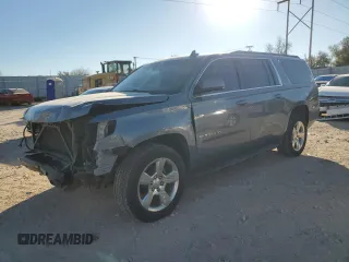 2016 Chevrolet Suburban LS with VIN 1GNSCGKCXGR408535, listed as a Copart auction lot 82984644 with 95,724 mi miles and Salvage title. Bid and sale history available at DreamBid. Image 1.