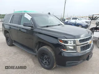 2019 Chevrolet Tahoe Commercial z VIN 1GNLCDECXKR231072, wystawiony jako IAAI lot #41800007 z przebiegiem 100 101 mil mil oraz . Historia ofert i sprzedaży dostępna na DreamBid. Obrazek 1.