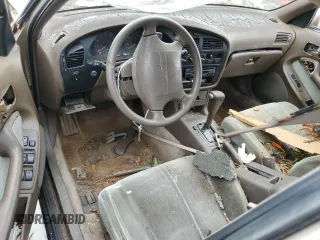 1993 Toyota Camry LE with VIN 4T1SK12E5PU316445, listed as a Copart auction lot 77534394 with 175,506 mi miles and Salvage Title. Bid and sale history available at carsss.com. Image 8.