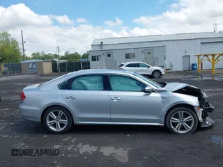 2014 Volkswagen Passat SE with VIN 1VWBT7A32EC070023, listed as a IAAI auction lot 42202567 with 116,438 mi miles and . Bid and sale history available at DreamBid. Image 13.