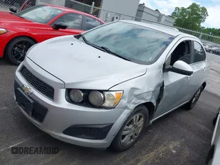 2012 Chevrolet Sonic LT with VIN 1G1JC5SH1C4180400, listed as a IAAI auction lot 42256431 with 188,681 mi miles and . Bid and sale history available at DreamBid. Image 2.