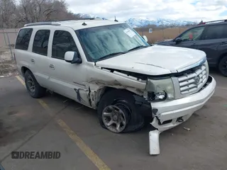 2003 Cadillac Escalade z VIN 1GYEK63N53R304400, wystawiony jako IAAI lot #41544697 z przebiegiem 207 913 mil mil oraz . Historia ofert i sprzedaży dostępna na DreamBid. Obrazek 1.