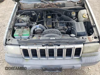 1997 Jeep Grand Cherokee Laredo z VIN 1J4GZ58S4VC502596, wystawiony jako Copart lot #88255865 z przebiegiem Nie podano mil oraz Nie do naprawy • Non repairable. Historia ofert i sprzedaży dostępna na DreamBid. Obrazek 11.