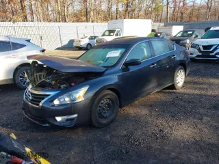 2015 Nissan Altima 2.5 SV with VIN 1N4AL3AP4FC295948, listed as a IAAI auction lot 41646614 with 72,739 mi miles. Bid and sale history available at carsss.com. Image 2.