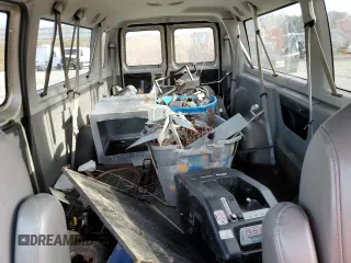 2010 Ford Econoline Passenger XL with VIN 1FBSS3BL9ADA05322, listed as a Copart auction lot 45006675 with 119,647 mi miles and Salvage Title. Bid and sale history available at carsss.com. Image 10.