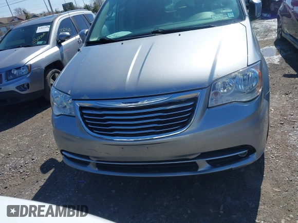 2016 Chrysler Town & Country Touring with VIN 2C4RC1BGXGR185642, listed as a IAAI auction lot 42092927 with 124,085 mi miles and . Bid and sale history available at DreamBid. Image 12.