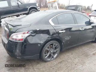 2014 Nissan Maxima SV with VIN 1N4AA5AP6EC437992, listed as a IAAI auction lot 41856233 with 69,059 mi miles and . Bid and sale history available at DreamBid. Image 6.