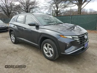 2022 Hyundai Tucson SEL with VIN 5NMJBCAE0NH070468, listed as a Copart auction lot 48060865 with 51,844 mi miles and Salvage Title. Bid and sale history available at carsss.com. Image 4.