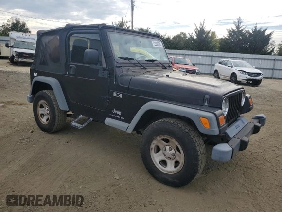 2005 Jeep Wrangler X with VIN 1J4FA39S85P350479, listed as a Copart auction lot 72330304 with 155,856 mi miles and Salvage Title. Bid and sale history available at carsss.com. Image 4.