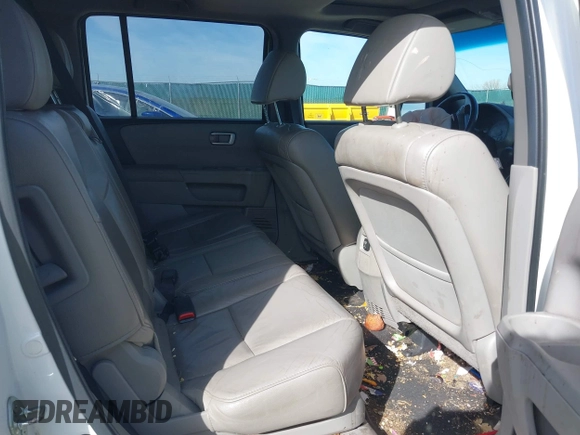 2012 Honda Pilot EX-L with VIN 5FNYF4H56CB021904, listed as a IAAI auction lot 41798179 with 190,617 mi miles and . Bid and sale history available at DreamBid. Image 8.