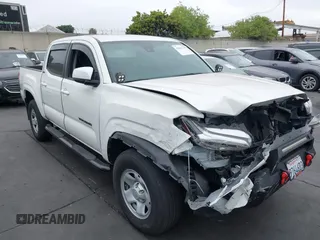 2021 Toyota Tacoma SR with VIN 3TYAX5GN2MT014892, listed as a IAAI auction lot 42462337 with 34,893 mi miles and . Bid and sale history available at DreamBid. Image 1.