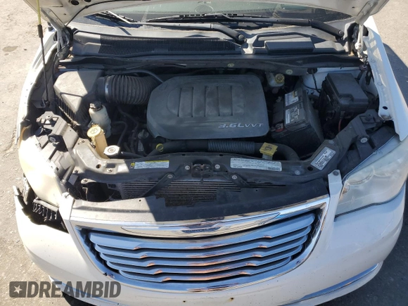 2011 Chrysler Town & Country Touring L z VIN 2A4RR8DG6BR702751, wystawiony jako Copart lot #58541045 z przebiegiem 170 144 mil mil oraz Szkoda całkowita • Salvage title. Historia ofert i sprzedaży dostępna na DreamBid. Obrazek 12.