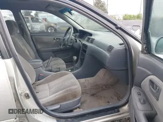 2000 Toyota Camry CE z VIN 4T1BG22KXYU690984, wystawiony jako IAAI lot #42222118 z przebiegiem 292 017 mil mil oraz . Historia ofert i sprzedaży dostępna na DreamBid. Obrazek 5.
