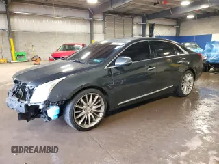 2014 Cadillac XTS Platinum with VIN 2G61W5S87E9151078, listed as a Copart auction lot 72786514 with 129,497 mi miles and Salvage Title. Bid and sale history available at DreamBid. Image 1.
