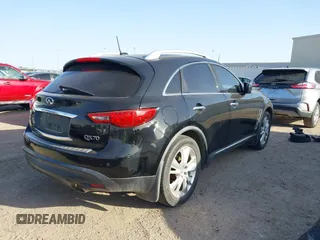2014 Infiniti QX70 with VIN JN8CS1MU5EM450712, listed as a IAAI auction lot 41734354 with 164,349 mi miles and . Bid and sale history available at DreamBid. Image 4.