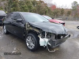 2015 Toyota Camry XLE with VIN 4T1BF1FK9FU114582, listed as a IAAI auction lot 41801187 with 165,199 mi miles. Bid and sale history available at carsss.com. Image 18.