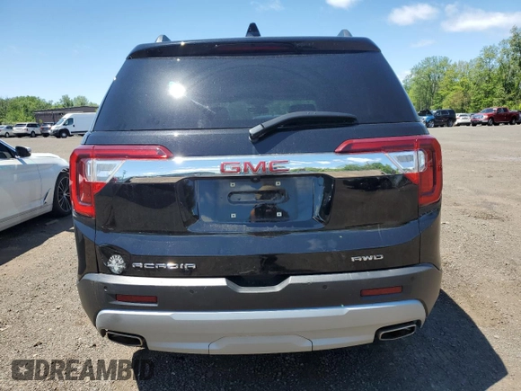 2021 GMC Acadia SLT z VIN 1GKKNULS6MZ111723, wystawiony jako Copart lot #57403095 z przebiegiem 67 732 mil mil oraz Szkoda całkowita • Salvage title. Historia ofert i sprzedaży dostępna na DreamBid. Obrazek 6.