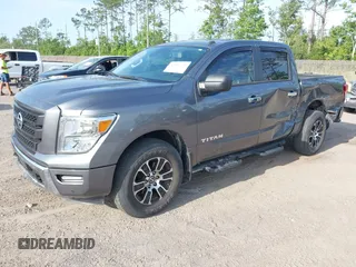 2021 Nissan Titan Pro-4X with VIN 1N6AA1ED0MN518084, listed as a IAAI auction lot 42147230 with 41,496 mi miles and . Bid and sale history available at DreamBid. Image 2.