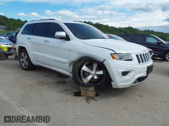 2016 Jeep Grand Cherokee Overland with VIN 1C4RJFCG2GC490420, listed as a IAAI auction lot 42200700 with 97,007 mi miles and . Bid and sale history available at DreamBid. Image 1.