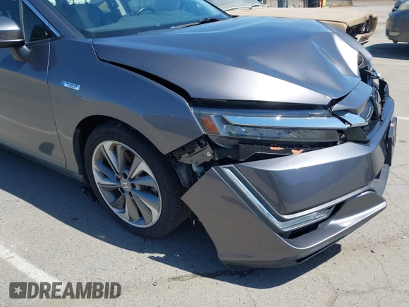 2018 Honda Clarity Touring z VIN JHMZC5F33JC021811, wystawiony jako IAAI lot #42272808 z przebiegiem 82 414 mil mil oraz . Historia ofert i sprzedaży dostępna na DreamBid. Obrazek 18.