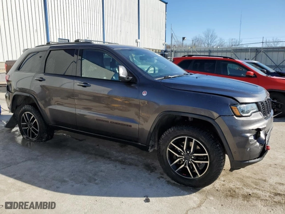2019 Jeep Grand Cherokee Trailhawk with VIN 1C4RJFLGXKC700612, listed as a Copart auction lot 42775945 with 145,229 mi miles and Salvage Title. Bid and sale history available at carsss.com. Image 4.