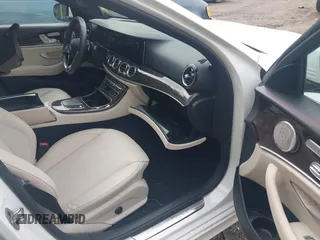 2021 Mercedes-Benz E-Class E 350 with VIN W1KZF8DBXMB003732, listed as a IAAI auction lot 40275325 with 28,211 mi miles. Bid and sale history available at carsss.com. Image 5.