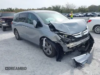 2019 Honda Odyssey EX with VIN 5FNRL6H58KB078225, listed as a IAAI auction lot 41890243 with 82,311 mi miles. Bid and sale history available at carsss.com. Image 1.