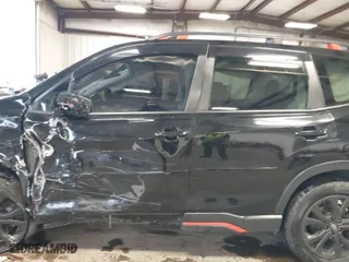 2019 Subaru Forester Sport with VIN JF2SKAKC2KH525616, listed as a IAAI auction lot 41968882 with 71,141 mi miles. Bid and sale history available at carsss.com. Image 14.